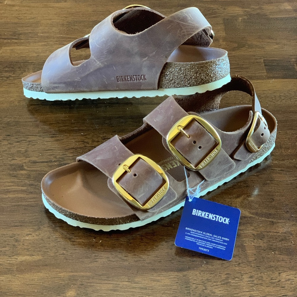 Birkenstock women’s Tan Sandals with Gold Buckles